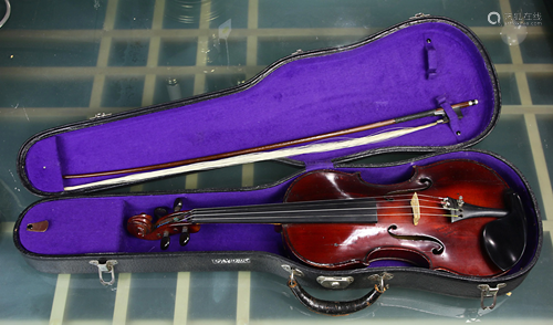 A 1927 Antonio Piccagliani labelled violin with bow