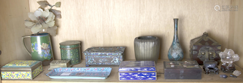 A shelf with Chinese stone, cloisonne and other metal