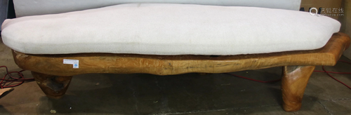 Natural free edge bench, having a shaped organic form