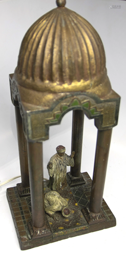 A Vienna style patinated metal figural lamp