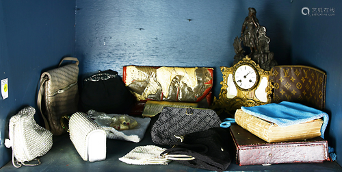 One shelf of associated vintage handbags