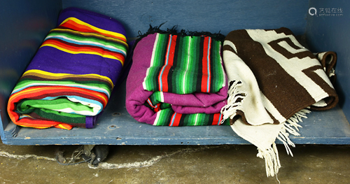 One shelf of Mexican textiles