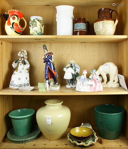 Three shelves of ceramics and earthenware decorative