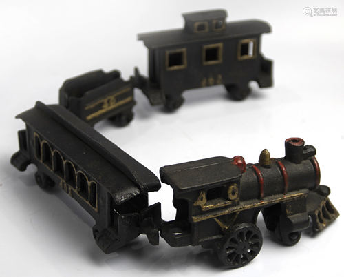 (lot of 4) Iron toy trains in various sizes