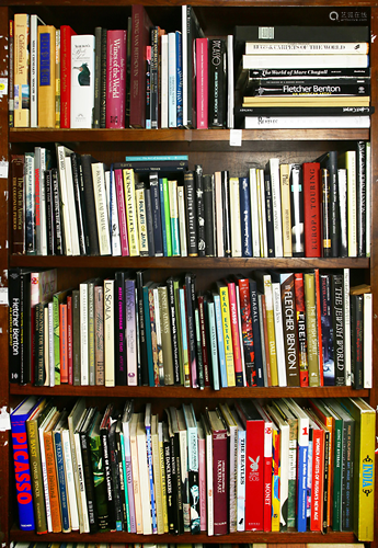 Four shelves of books on mostly art, music, theology