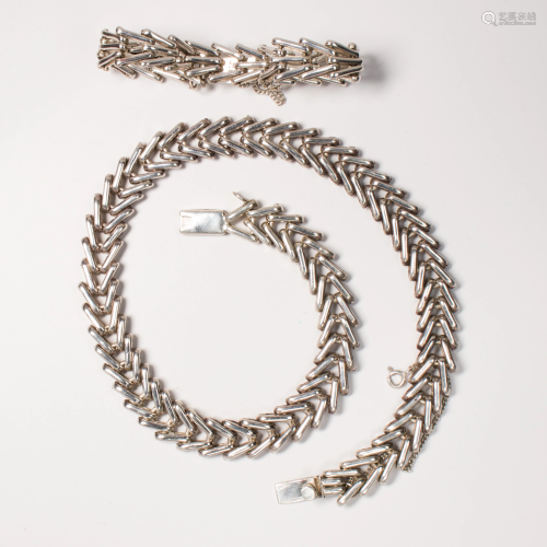 A Mexican silver necklace and bracelet suite