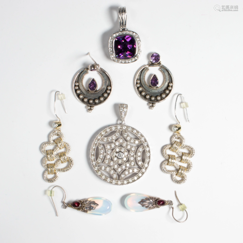 A group of silver fashion jewelry