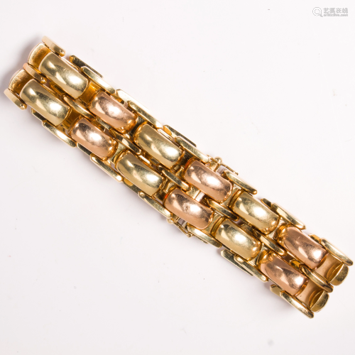 A fourteen karat bicolor gold bracelet