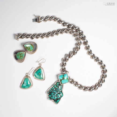 A group of turquoise and silver jewelry