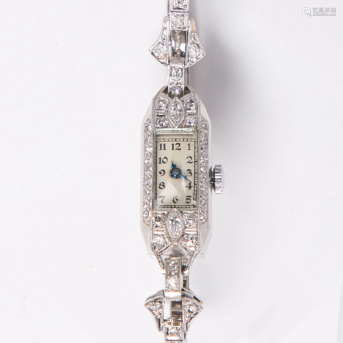 A diamond and platinum dress wristwatch