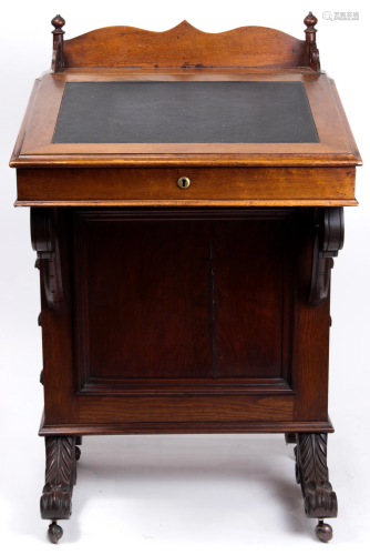 A Victorian davenport desk circa 1870