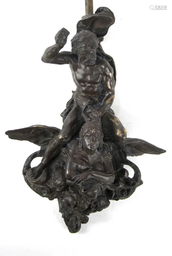 A patinated bronze figural door knocker