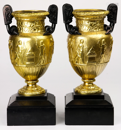 A pair of Neoclassical style gilt bronze urns