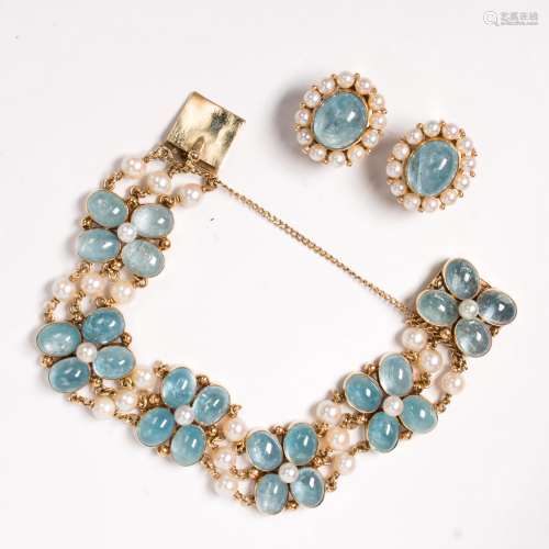 An aquamarine, pearl and fourteen karat gold earclip