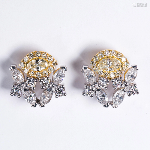 A pair of diamond and eighteen karat bicolor gold