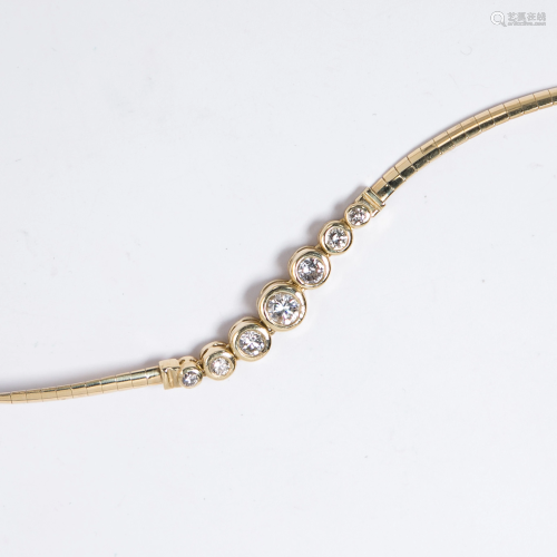 A diamond and fourteen karat gold necklace
