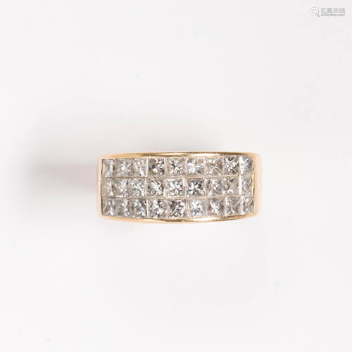 A diamond and fourteen karat gold ring