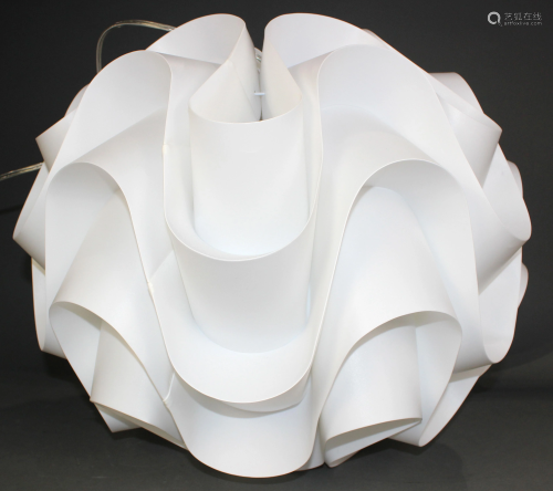 A Contemporary wave form hanging fixture in the Danish