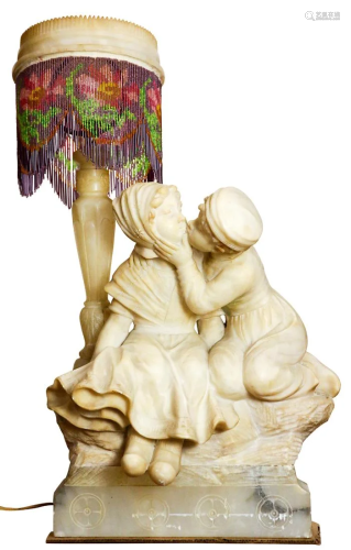 An Italian carved alabaster figural lamp circa 1920