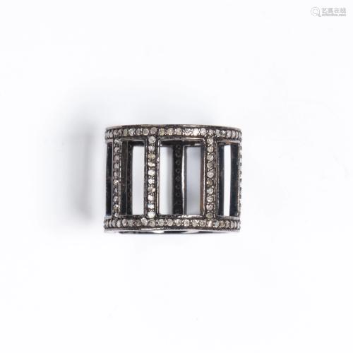 A diamond and blackened silver ring