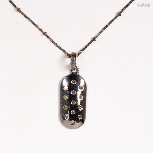A diamond and blackened silver pendant necklace