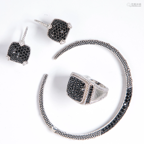 A group of black diamond and sterling silver jewelry,