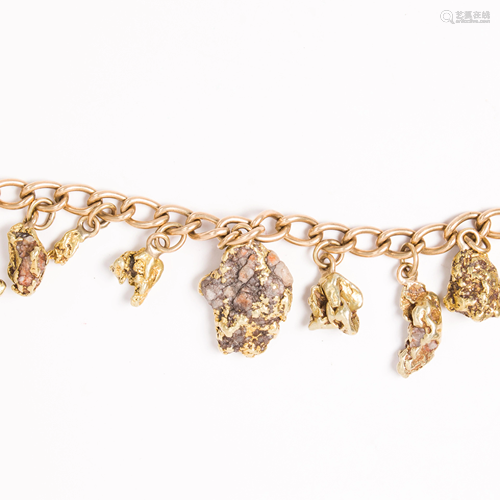 A gold nugget and fourteen karat gold bracelet