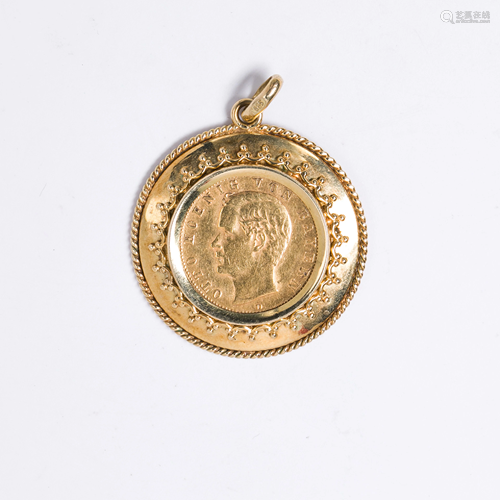 A gold coin and fourteen karat gold pendant