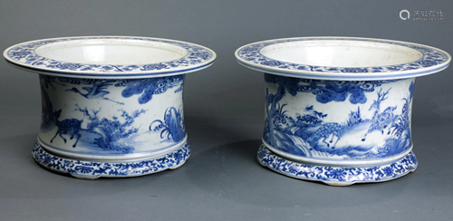 A pair of Chinese blue and white jardinieres