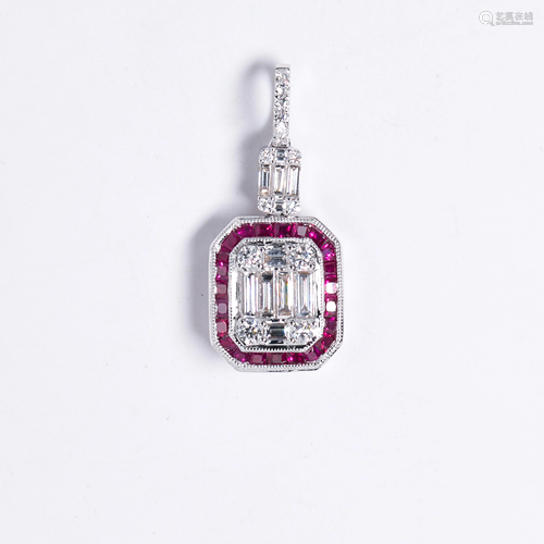 A ruby, diamond and eighteen karat white gold pendant