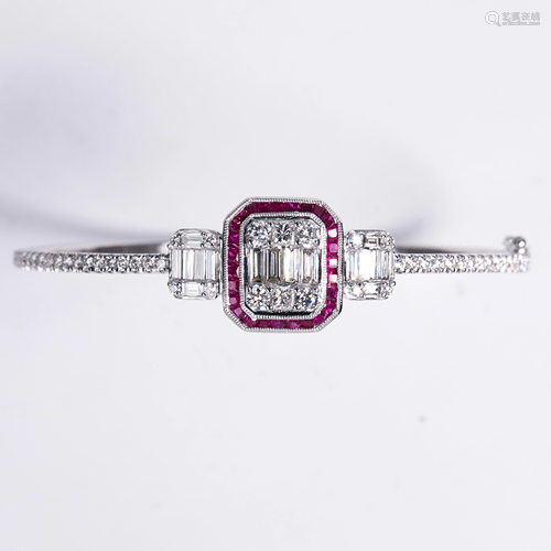 A ruby, diamond and eighteen karat white gold bracelet