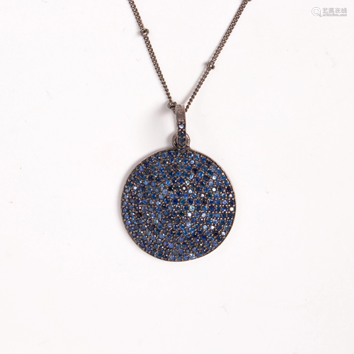 A sapphire and blackened silver pendant necklace