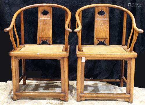 A Chinese pair elmwood horseshoe chairs