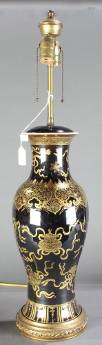 A Gilt-Decorated Black-Glazed 'Bajixiang' Lamp