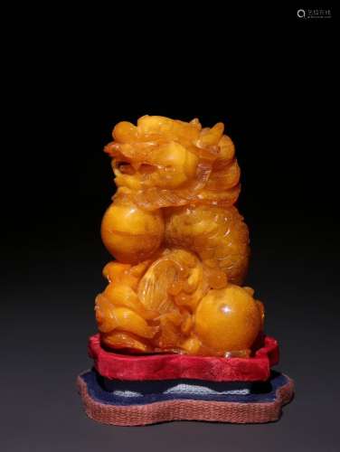 A Chinese Amber Beast Ornament