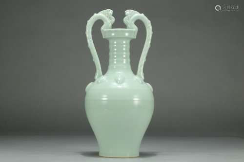 A Chinese Porcelain Pea-Green Glazed Dragon Vase