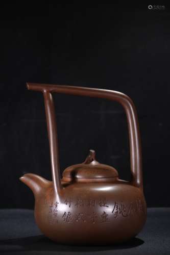 A Chinese Zisha Teapot With Handle