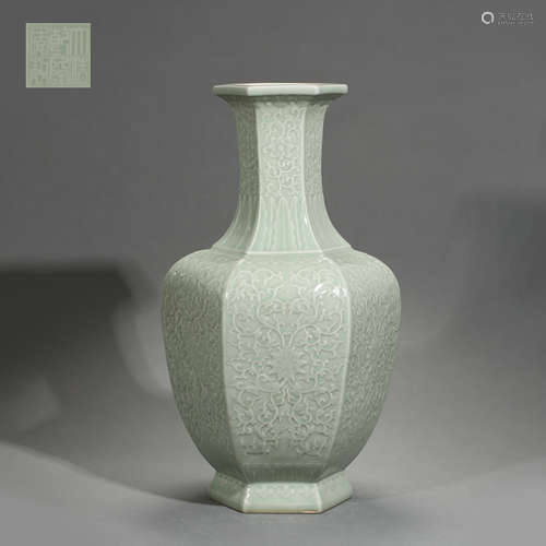 A CELADON-GLAZED CARVED  SIX-SQUARE VASE, QING DYNASTY, CHINA