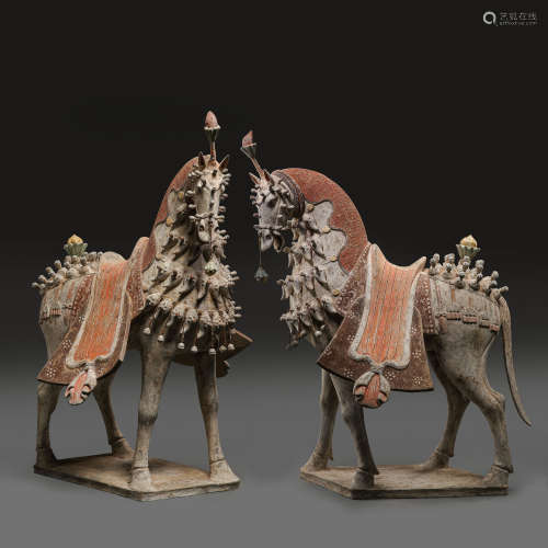 A PAIR OF ANCIENT CHINESE POTTERY HORSES