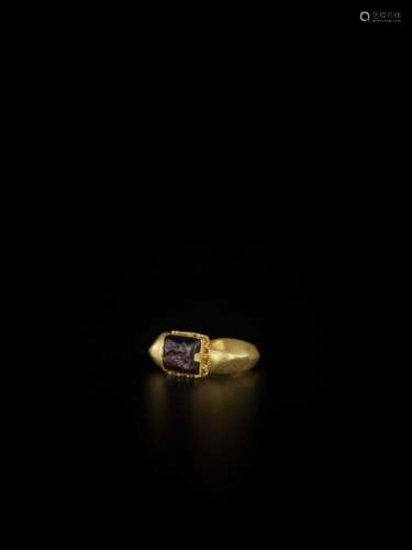 A Pyu Gold Ring With Ruby Inta…