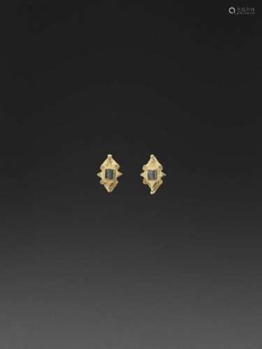 A Pair Of Cham Gold Earrings W…