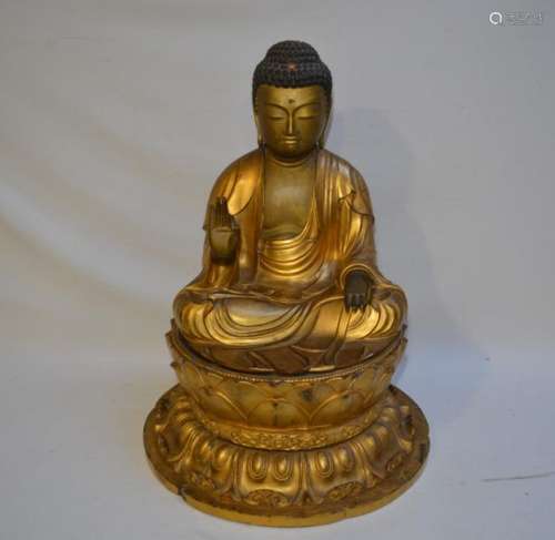 JAPON Bouddha assis en bois sculpté peint et doré,…