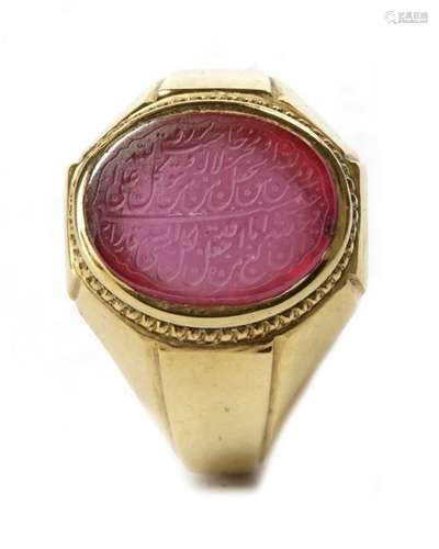 A Mughal Ruby And Gilt Silver …