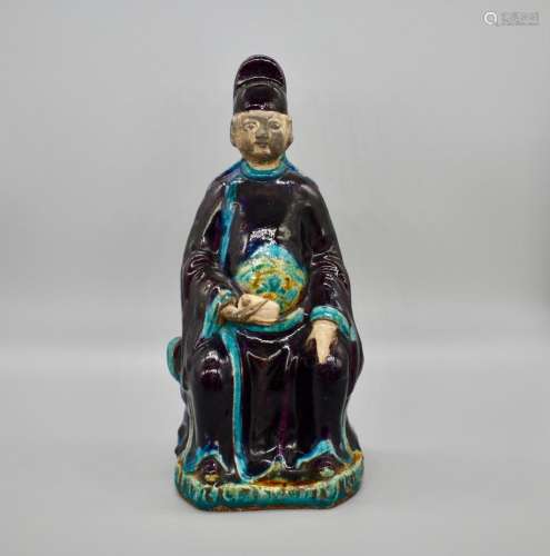 Chinese Aubergine and turquoise glazed seated official