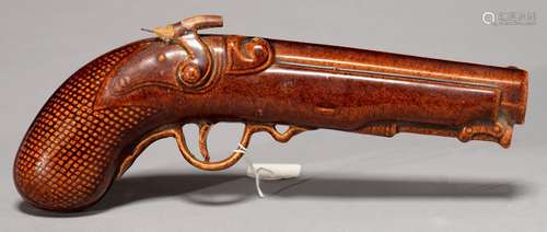 A BRITISH TREACLE BROWN GLAZED EARTHENWARE PISTOL NOVELTY GIN FLASK, C1840, 28CM L Hammer damaged