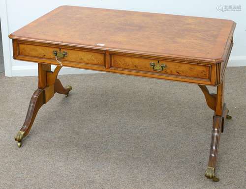 A YEW WOOD LIBRARY TABLE, 20TH C, IN REGENCY STYLE, THE CUT CORNERED TOP FITTED WITH MOULDED DRAWERS