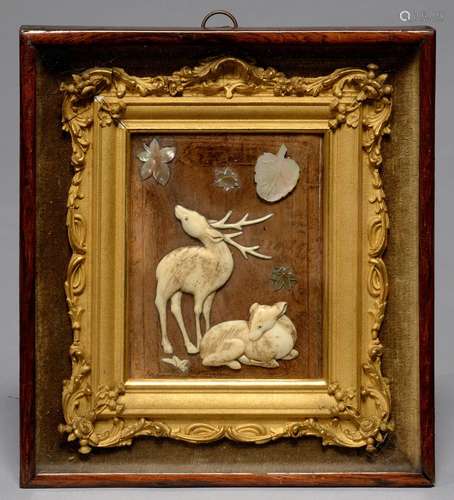 A JAPANESE WOOD PLAQUE, INSET AND APPLIED WITH CARVED BONE AND MOTHER OF PEARL DEER AND LEAVES IN