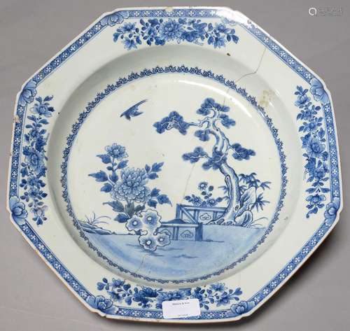 A CHINESE OCTAGONAL BLUE AND WHITE BASIN, 18TH C, PAINTED WITH PINE, TREE PEONY AND FENCE SURROUNDED