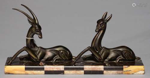 A FRENCH ART DECO BRONZED SPELTER GROUP OF DEER ON MARBLE BASE, C1930, 48CM L Good condition