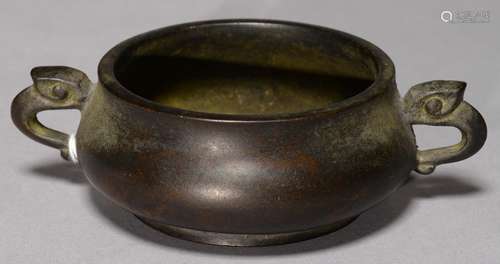 A CHINESE BRONZE CENSER, 19TH C, THE COMPRESSED BOWL WITH ZOOMORPHIC HANDLES, ON SLIGHTLY FLARED